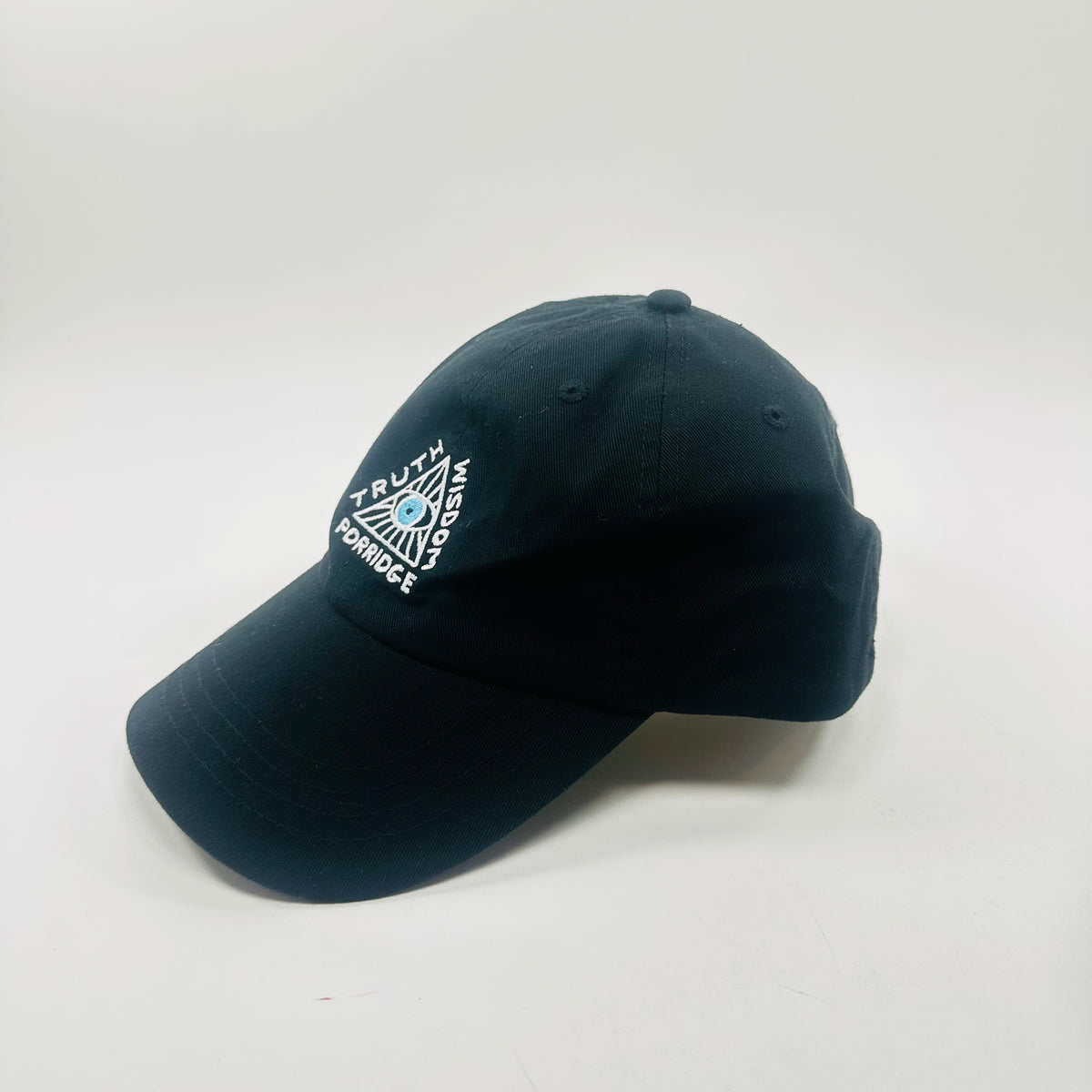 David Shrigly Cap - Truth Wisdom Porridge