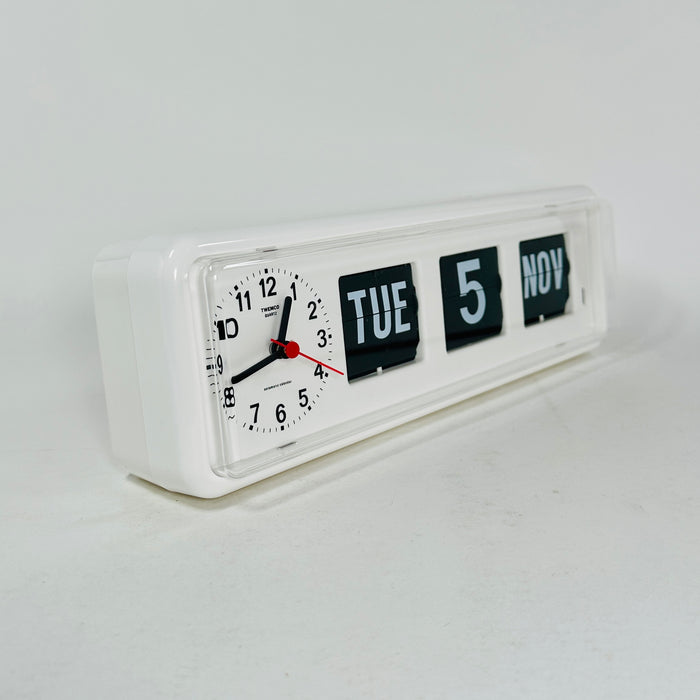 Retro white analog clock with clock face and vintage mechanical flip date, mid-century modern desk or wall clock